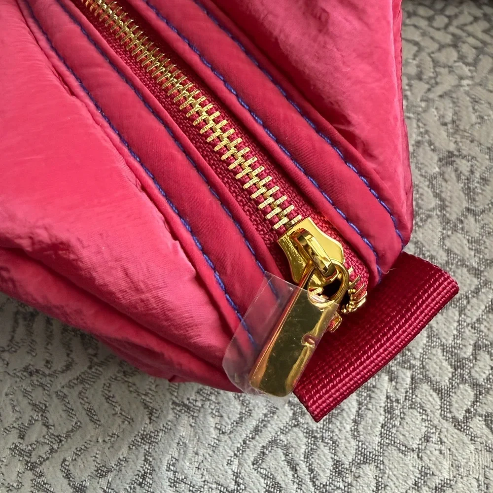 Burberry fuchsia makeup or cosmetics pouch
